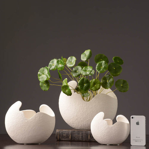 Sculptural white vase