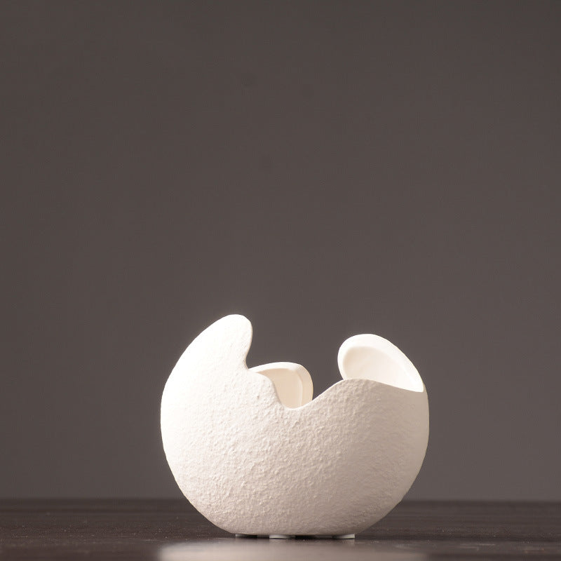 Sculptural white vase